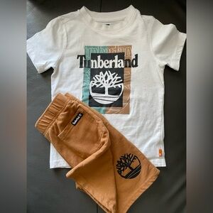 Timberland White Tee with Green and Brown Logo & Tan Shorts